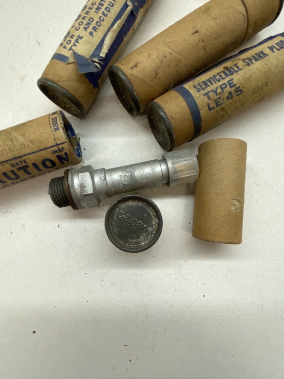 4 -NOS AUTOLITE SH2M IN ORIGINAL IN TUBE – military auxillary power unit plugs??