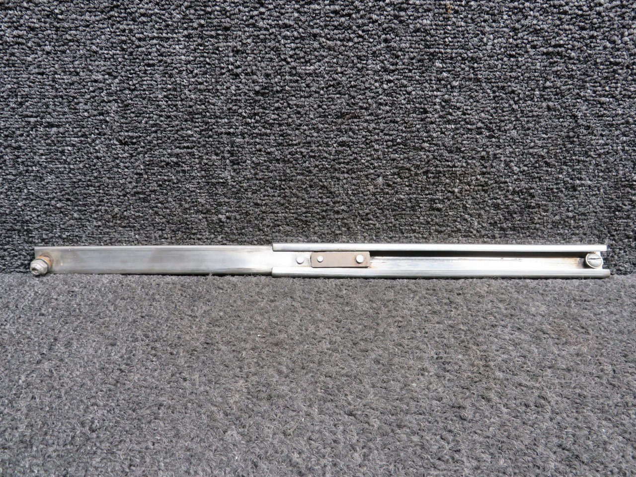 37666-000 (Use: 37666-800) Piper PA34-200T Nose Baggage Door Holder Assembly